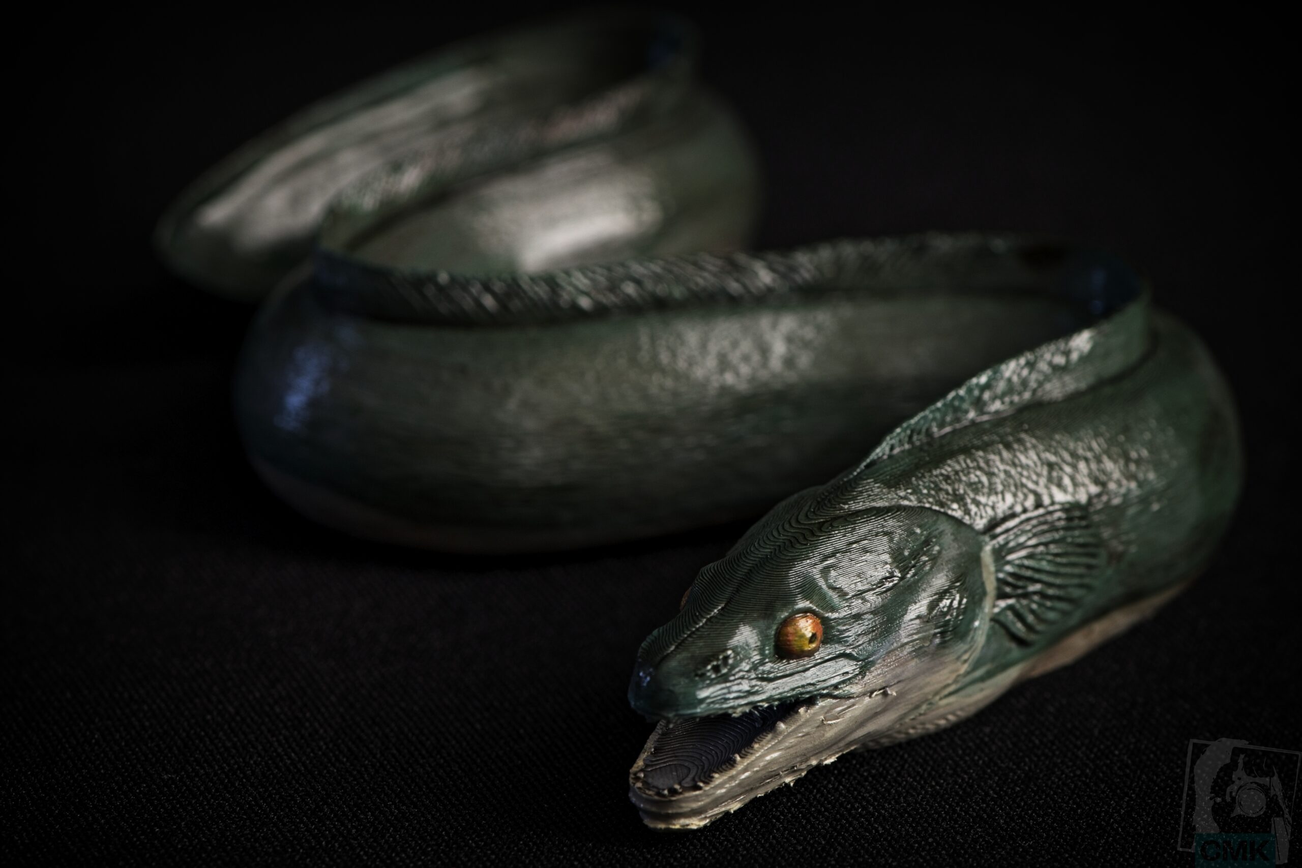 Art print inspired by Post Mortem by Frank van de Goot, featuring an eel as the central form.